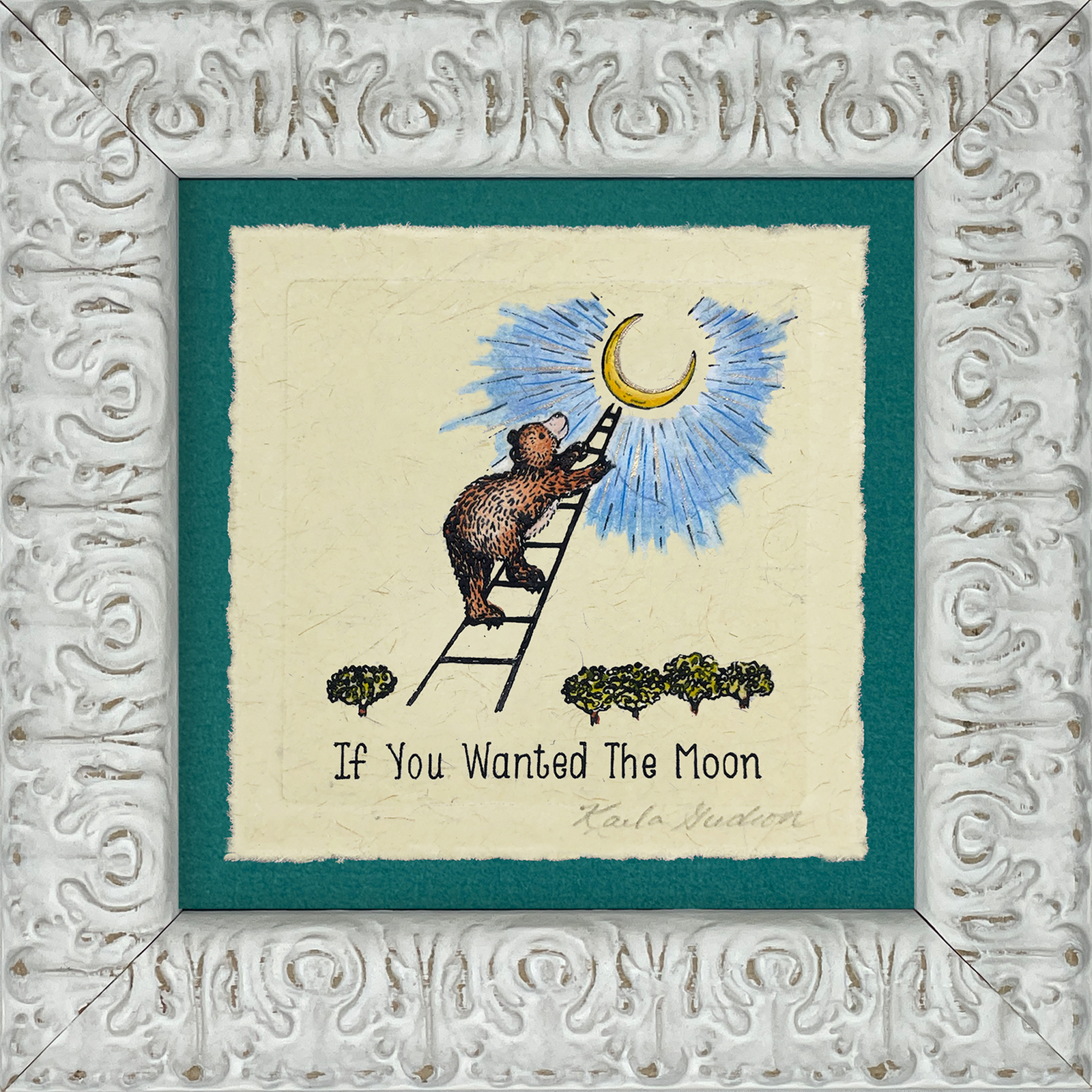 A framed handcrafted artwork featuring a bear reaching for the moon with a text overlay 'If You Wanted The Moon' by artist Karla Gudeon.